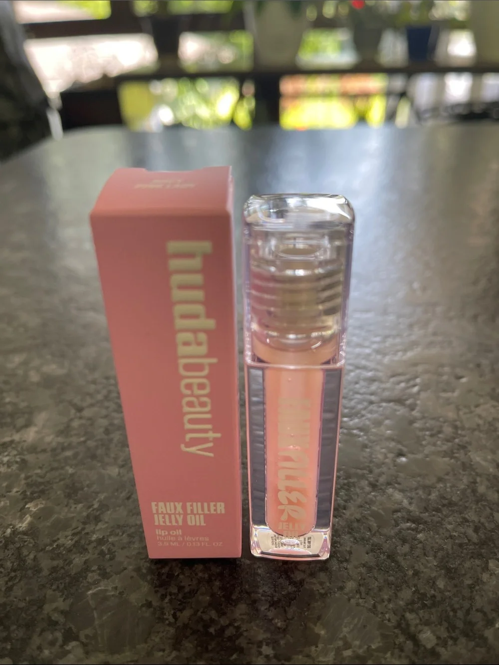 Huda Faux Filler Jelly Oil Lip Oil in Juicy Pink Lady